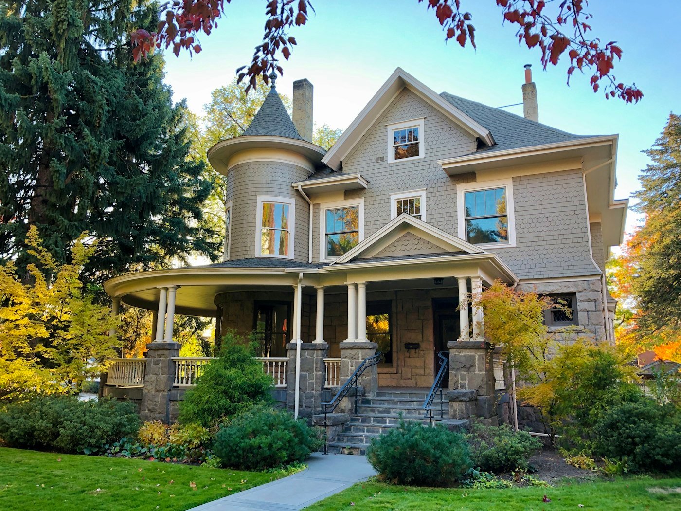 Grey Victorian home with white trim