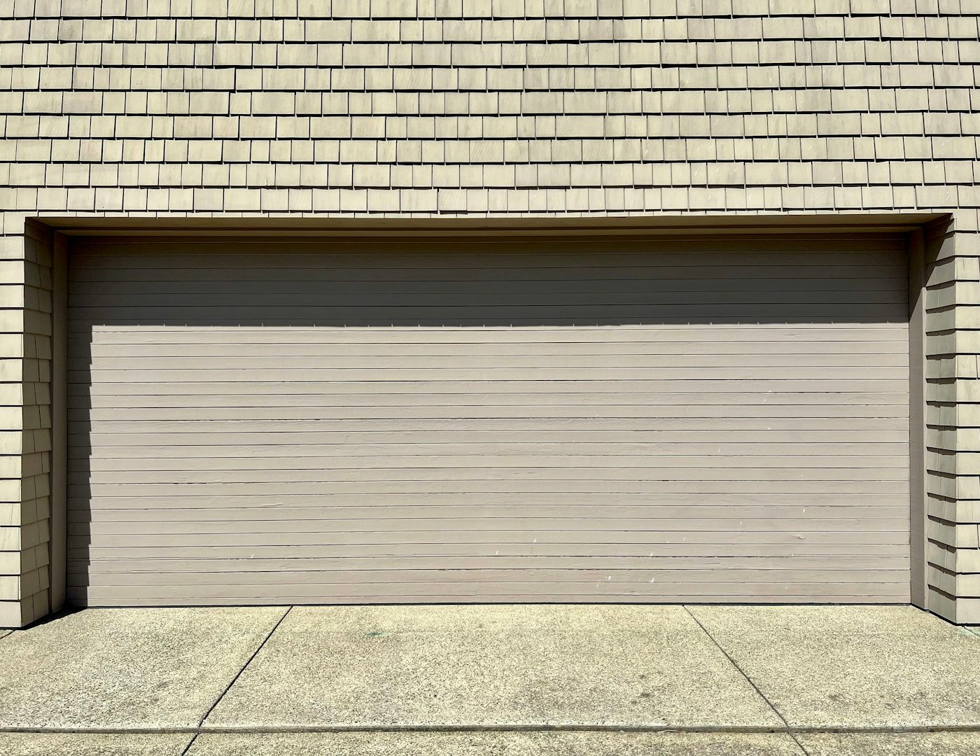 Insulated steel garage door