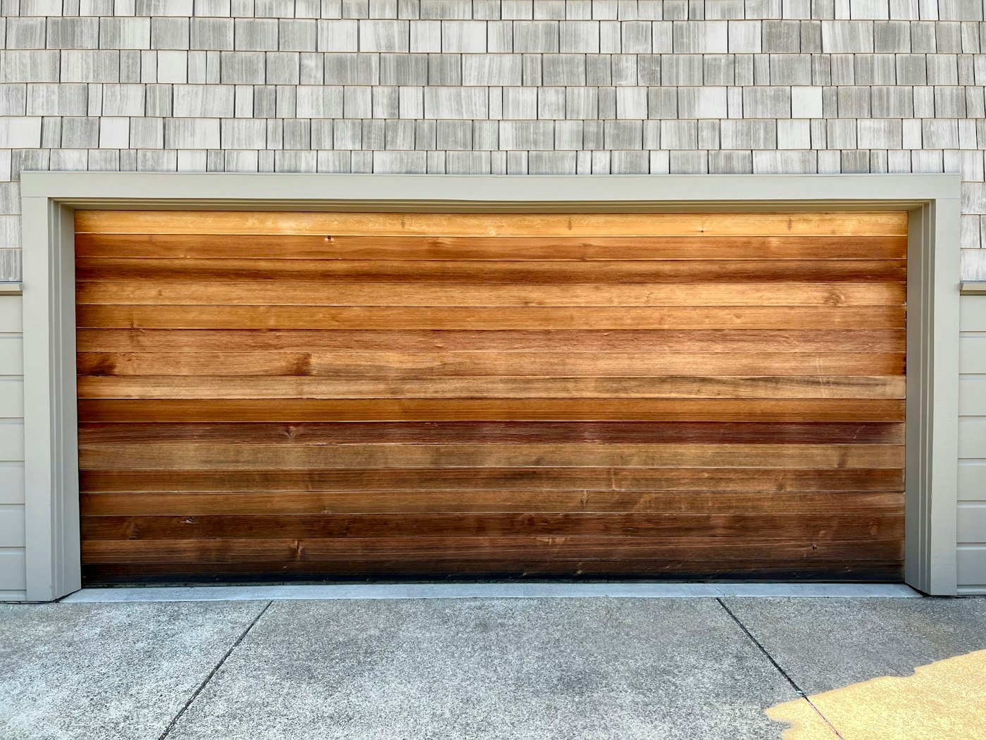 Horizontal wood-look garage door
